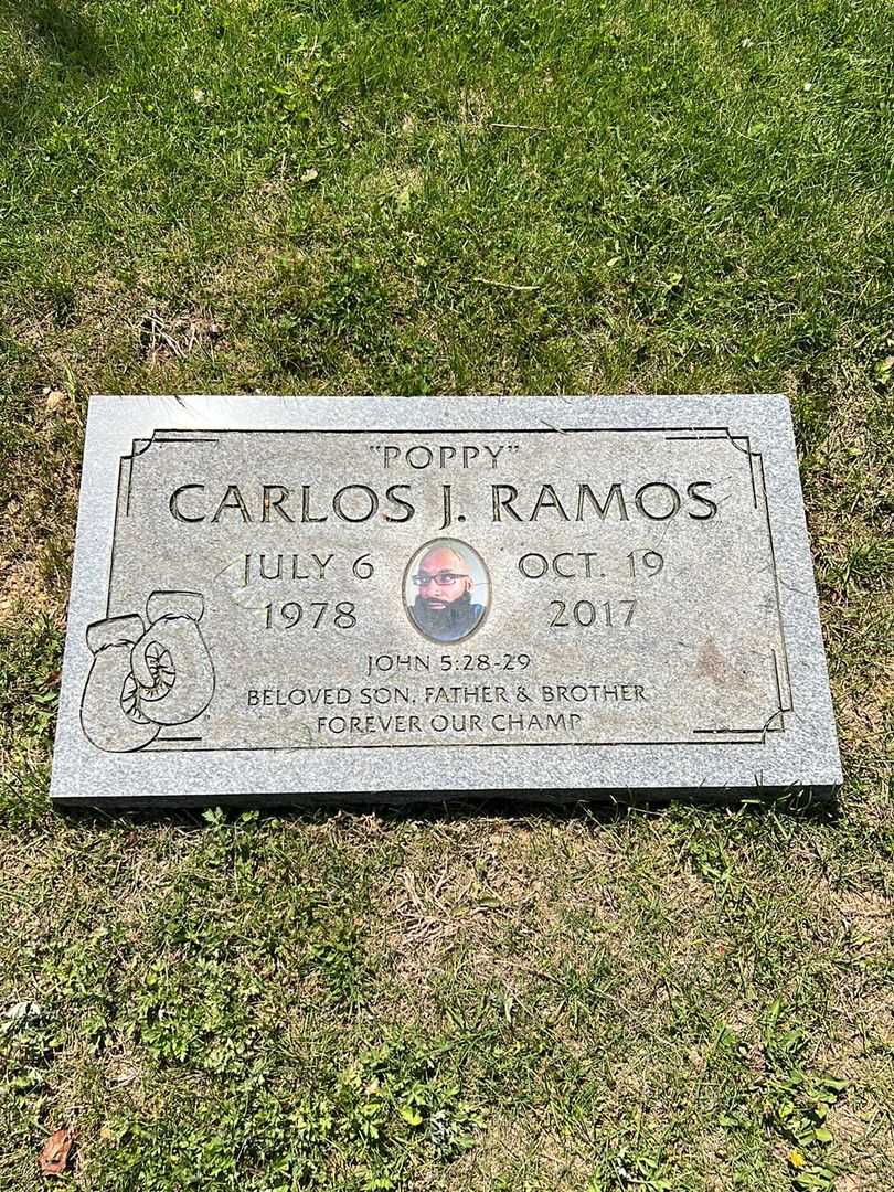 Carlos J. "Poppy" Ramos's grave. Photo 2